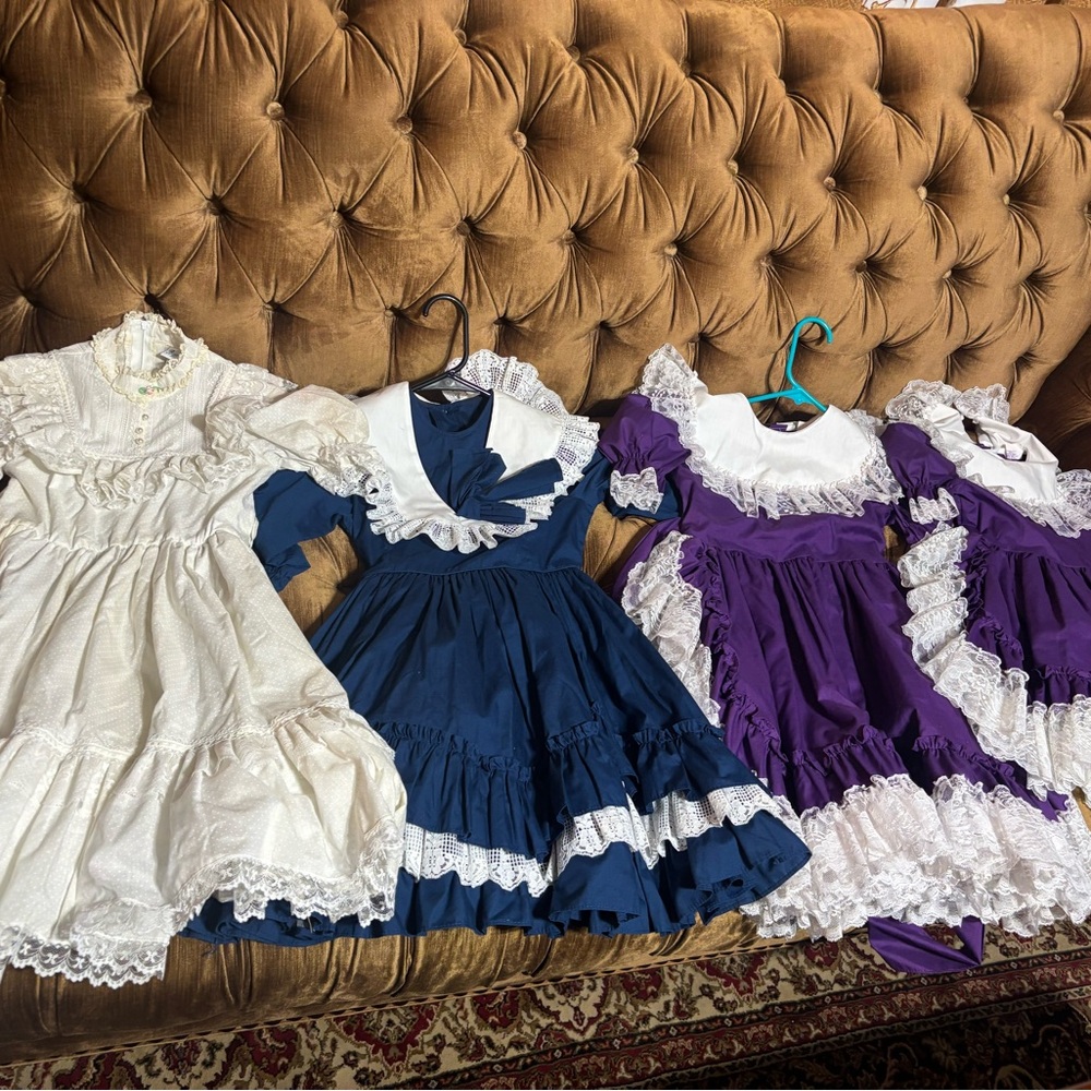 Victorian Style Dresses in White, Blue, and Purple